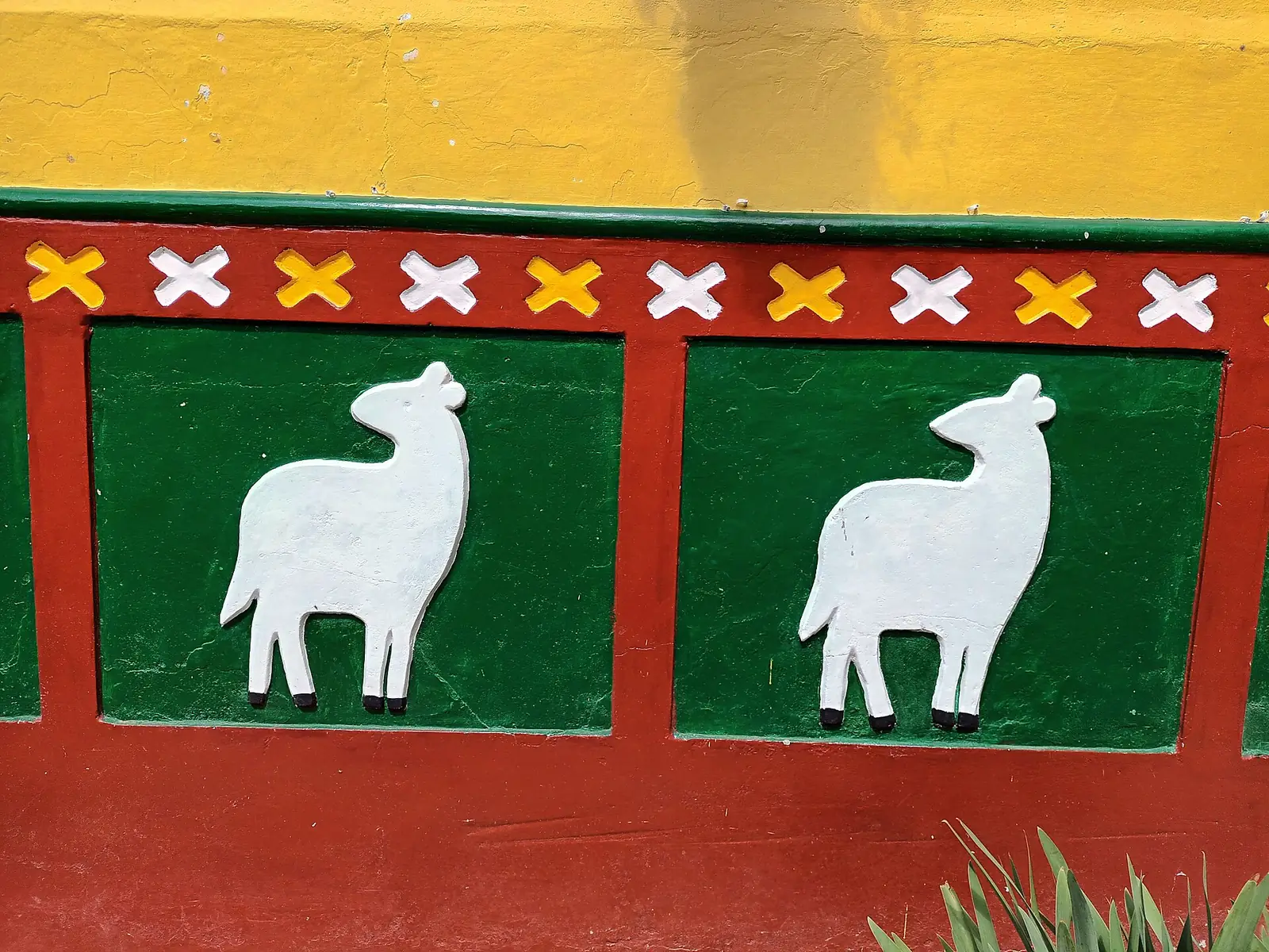 Painted zócalos along a street in Guatapé
